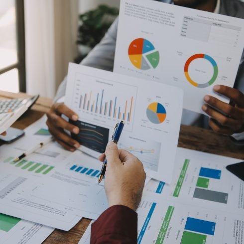 Group of Young Asian business team creative businesspeople coworker in office Happy to be successful partnership teamwork celebrating achievement and success concept.